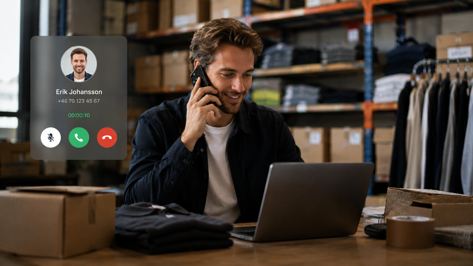A contemporary, workplace scene set in a warehouse or packing area features a man on a phone call